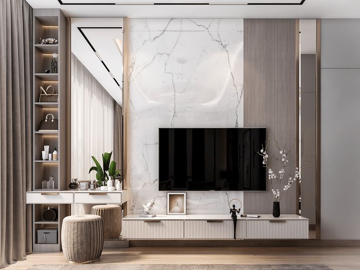 a modern living room with white marble walls and flooring, large television on the wall