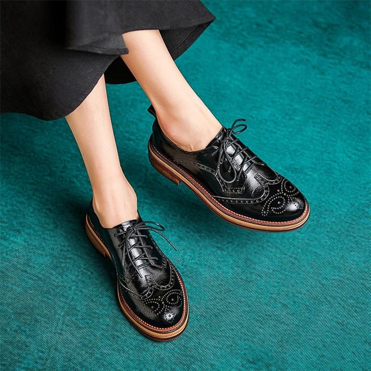 Introducing our Autumn Chic Leather Brogue Lace-up Flats, crafted with the finest quality GENUINE LEATHER for an elegant and sophisticated look. Made from Cow Leather, these flats offer durability and a luxurious feel, while the round toe shape adds a touch of femininity. With a rubber outsole for excellent traction and a Full Grain Leather insole for all-day comfort, these flats are perfect for any occasion. Elevate your style and make a statement with these timeless and versatile flats. Womens Oxfords Shoes, Autumn Chic, White Casual Shoes, Oxfords Shoes, Handmade Leather Shoes, Leather Brogues, Lace Up Flats, Shoes Handmade, Chic Leather