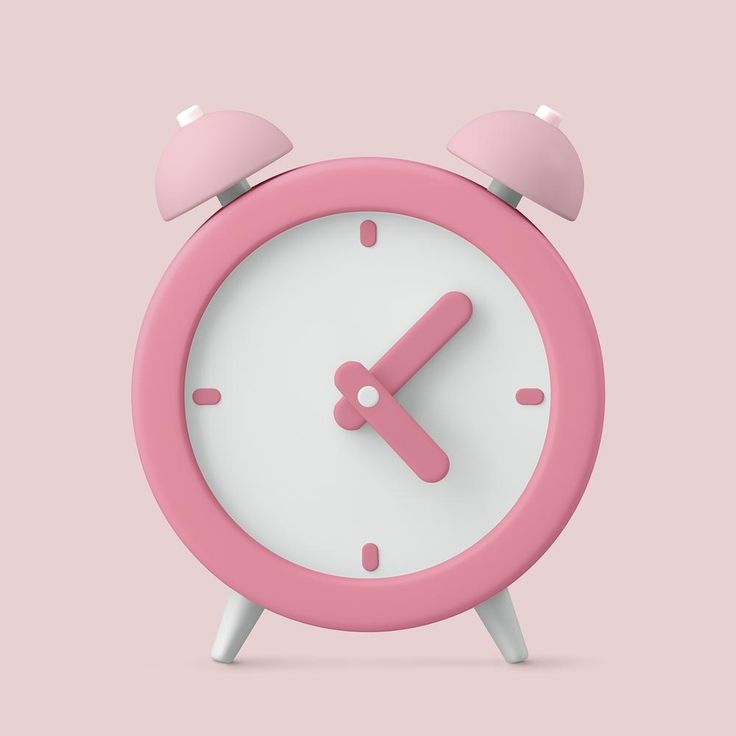 an alarm clock with pink and white dials on a light pink background, showing the time eleven o'clock