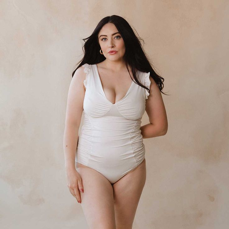 With perfectly placed ruching and a gorgeous deep V, our Riptide One-Piece is an all-time Albion favorite! In a gorgeous Ivory white, this suit is chic, stylish, and incredibly flattering. Removable bust cups Fully-lined Ruffle sleeves Ruched bust & waist V neckline: Nursing Friendly! 45 UPF FREE U.S. Standard Shipping! More info hereModels Tiffany and Hannah are wearing an XSModel Starlie is wearing a M 90% NYLON - 10% SPANDEXHand wash cold and lay flat or hang to dry Albion Fit Swim, Albion Fit Swimsuit, Albion Fit, Maternity Swimsuit, Swimming Workout, Nursing Friendly, Swim Skirt, Swim Suit Bottoms, Ruffle Sleeves