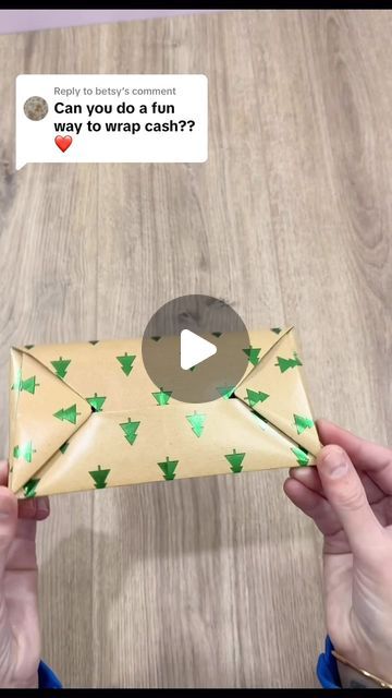 someone is holding an envelope with christmas decorations on it and the message can you do fun way to wrap cash?