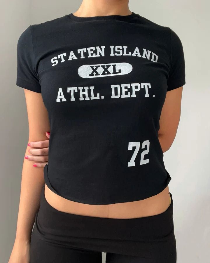 Staten Island Athl. Dept. baby tee (full length) – Bit By Angie Sporty Stretch Cropped T-shirt With Graphic Print, Sporty Letter Print Crop Top T-shirt, Black Slogan Crop Top T-shirt, Trendy Stretch Cropped T-shirt For Streetwear, 90s Style Stretch Black T-shirt, 90s Black Stretch T-shirt, Black Stretch 90s Style T-shirt, Black Y2k Cropped T-shirt For Spring, Graphic Tee Cropped T-shirt For Streetwear