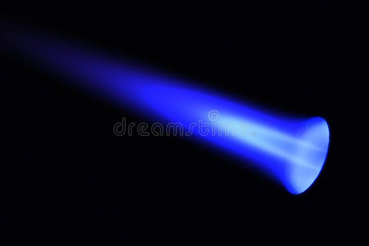 blue light emitting from a black background royalty images