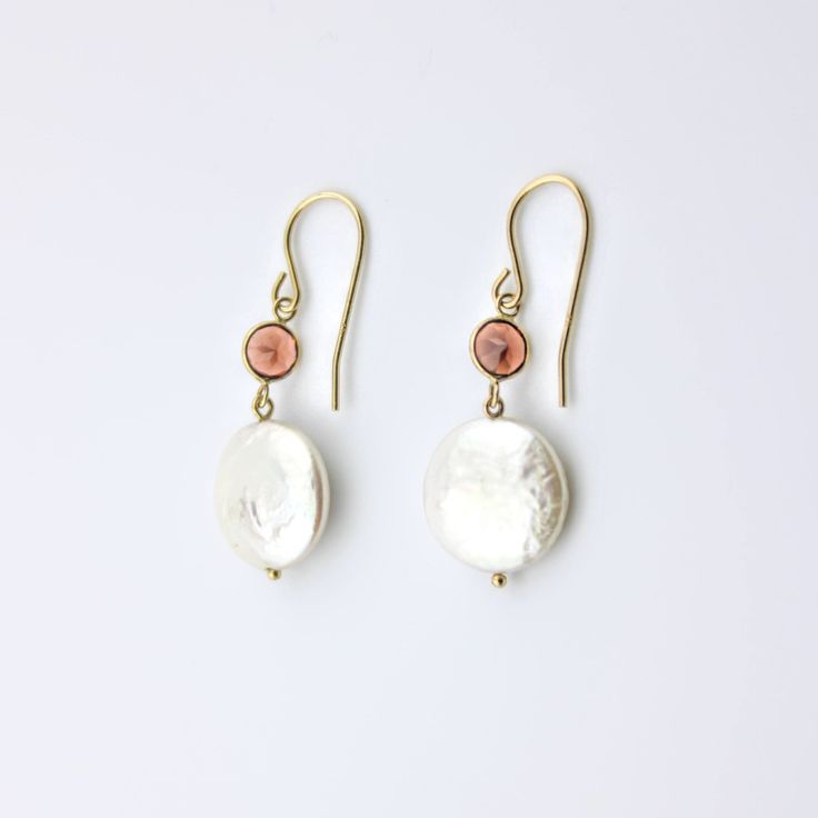 These 14 karat solid yellow gold earrings are pretty. They include coin pearl and Round Garnet Gemstones. These beautiful dangle earrings will make an excellent gift for yourself or a loved one on any occasion. Coin Pearl Size: 13 mm Garnet Size: 5 mm Handmade Yellow Gold Plated Pearl Earrings, Luxury 14k Gold Pearl Drop Jewelry, Fine Jewelry Pearl Drop With Round Beads, Oval 14k Gold-filled Jewelry For Anniversary, Classic Pink Gold Jewelry For Anniversary, Hypoallergenic Round Jewelry For Formal Occasions, Hypoallergenic Pink Gold Jewelry For Gift, Hypoallergenic Round Formal Jewelry, Sterling Silver Yellow Gold Pearl Earrings For Gift