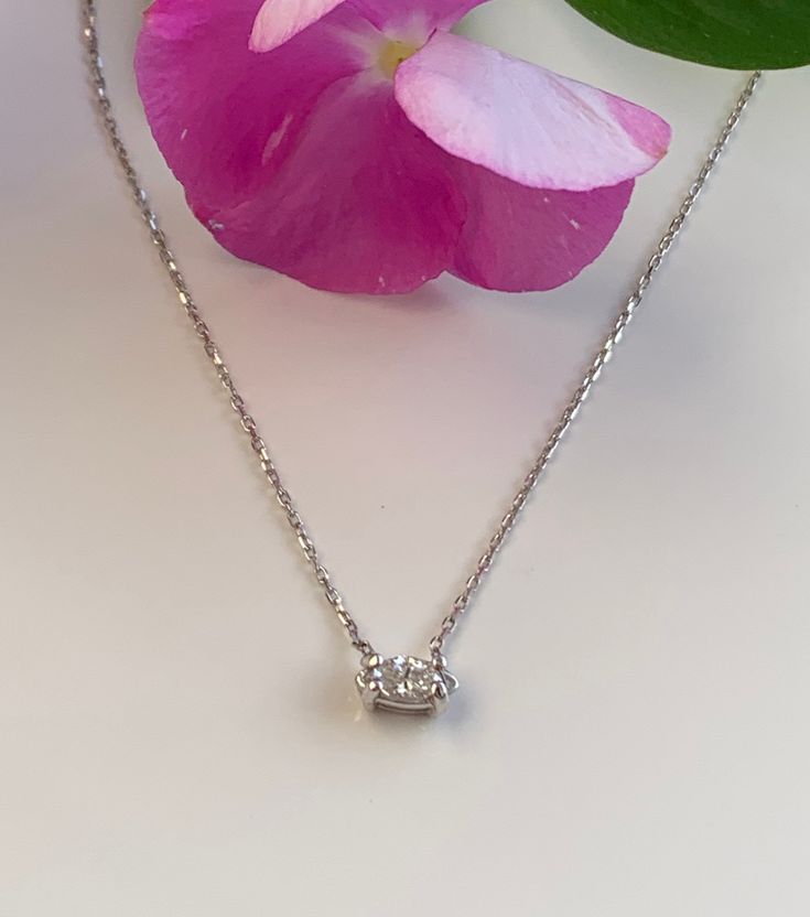 "One of a kind classic solitaire diamond necklace. So cute and dainty for elegance. A must have for the ladies who like one of a kind pieces. Definitely a timeless pieces that can be worn everyday. East west Marquise Solitaire Diamond Necklace in 14k White Gold Metal14k white gold Pure gold / not plated Diamond weight0.15ct G ....color VS1 quality All natural Diamond Length about 16\" with one extension to 18\" inches long Necklace...handmade in USA Available in 14k rose gold too" Elegant Oval Solitaire Necklace With Single Cut Diamonds, Elegant Solitaire Necklace With Diamond Accents In Oval Pendant, Classic Solitaire Necklace With Single Diamond, Elegant Oval Pendant Solitaire Necklace With Single Diamond, Elegant Solitaire Necklace With Diamond Accents, Single Diamond Oval Pendant Necklace, Classic Oval Solitaire Necklace With Single Cut Diamonds, White Solitaire Pendant Necklace With Single Diamond, White Solitaire Diamond Pendant Necklace