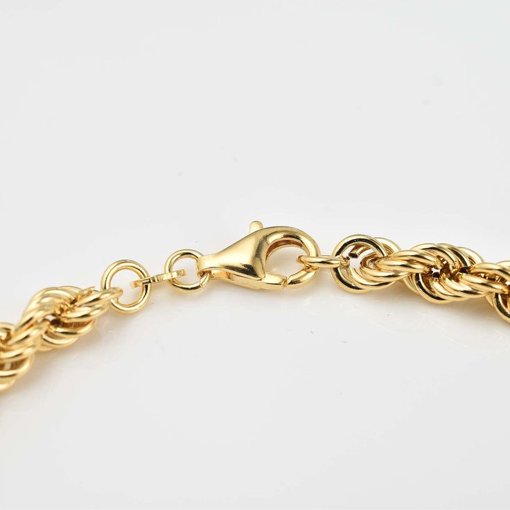 Make a statement with our Rope Chain Bracelet! Featuring a unique rope chain design and a 100mm hollow chain, this 7.25 inch bracelet is made in sterling silver and gold plated for a luxurious touch. Perfect for stacking, this bracelet is a must-have for any jewelry collection. Gold-plated Snake Chain Bracelet In Yellow Gold, Gold Plated Yellow Gold Snake Chain Bracelet, Elegant 14k Gold Rope Chain Bracelet, Chunky Chain Yellow Gold Bracelet, Metal Link Rope Chain Jewelry, Elegant Bracelets With Rope Chain And Link Shape, Gold Rope Chain Bracelet Gift, Elegant Bracelets With Link Rope Chain, Elegant Bracelets With Rope Chain Link