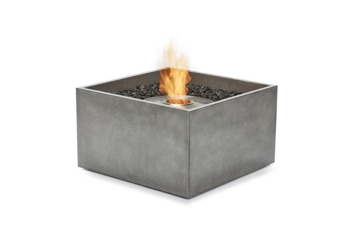 a square fire pit with rocks and water in the center on an isolated white background