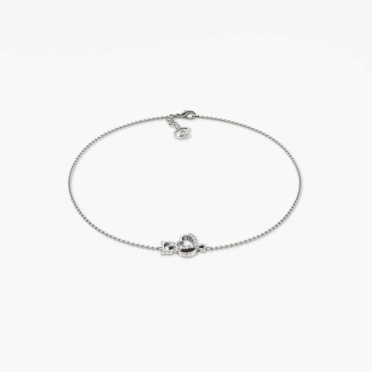 A representation of forever self-love, this splendid light wear bracelet with a mini heart on it appraises the affection that you are worthy and deserve the love. There's a tiny crown on it that implies the priority and value of you. Be in love with yourself and celebrate your worth with this aesthetic soft bracelet. Gift this to your loved ones and express your love. The total weight of this absolute 8.6mm thick bracelet of 14K gold and 18K gold metal type is 1.04g and 1.24g with a width of 13. Sterling Silver Jubilee Bracelet For Promise, Formal Diamond Heart Bracelet, Dainty Everyday White Gold Charm Bracelet, Dainty White Gold Charm Bracelet For Everyday, Elegant Heart Bracelet With Jubilee Detail, White Gold Charm Bracelet For Everyday, White Gold Diamond Bracelets With Heart Charm, White Gold Diamond Bracelet With Heart Charm, Elegant Silver Heart Bracelet For Everyday