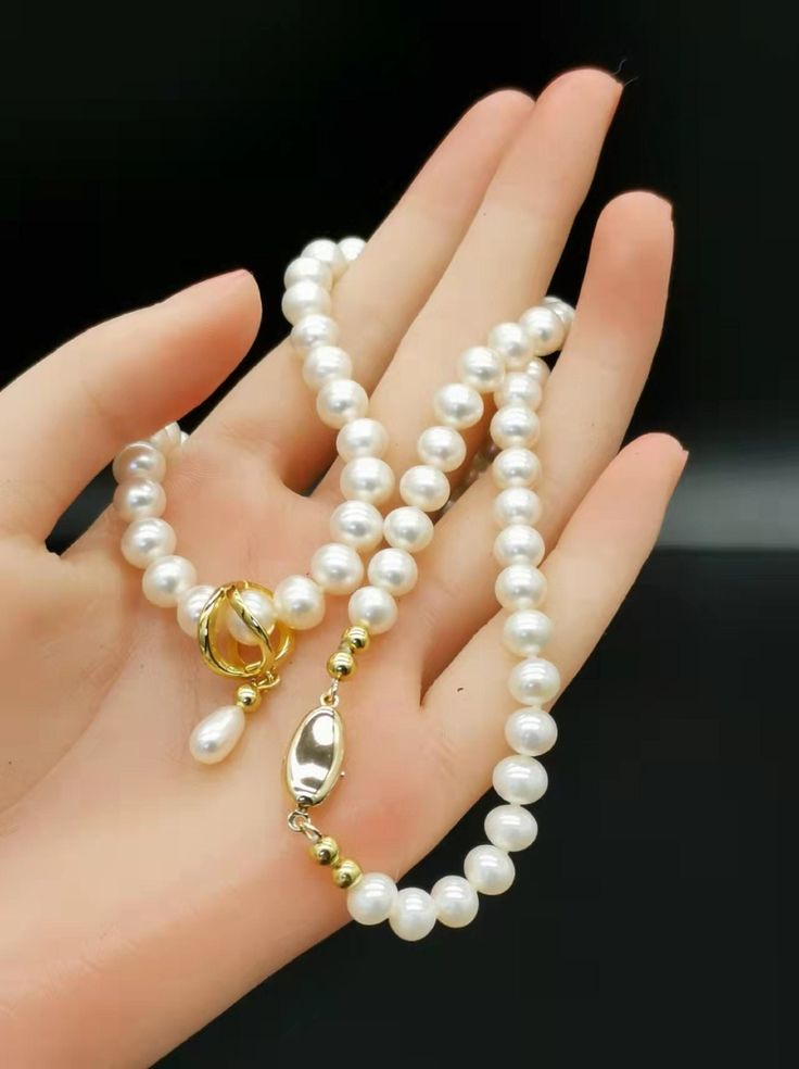 Mother's Day will be coming, and I offer you several of the Mothers' favorite jewelry - Pearls of High quality natural freshwater pearl necklace. Because I believe that the Mother is the most beautiful pearl in your heart, she contributes light and warmth to your family,.And the beautiful pearls as gifts are the most   love and blessings. At the same time, velvet jewelry boxes and "Thanks"  card are provided for free . I'm ready for your Mother's Day for you. Notice: Earrings are not included, Please purchase separately if needed. https://www.etsy.com/shop/EAWESThouse?ref=shop_sugg Gift Pearl Necklace With Round Beads, Pearl White Necklace With Pearl Pendant, Mother's Day Pearl White Necklace With Pearl Charm, Pearl Necklace With Pearl Charm For Mother's Day, Classic Pearl Necklace For Anniversary And Mother's Day, Pearl Necklaces For Anniversary, Single Strand Pearl Necklace Gift, Mother's Day Round Pearl Necklace, Classic Round Pearl Necklace For Mother's Day