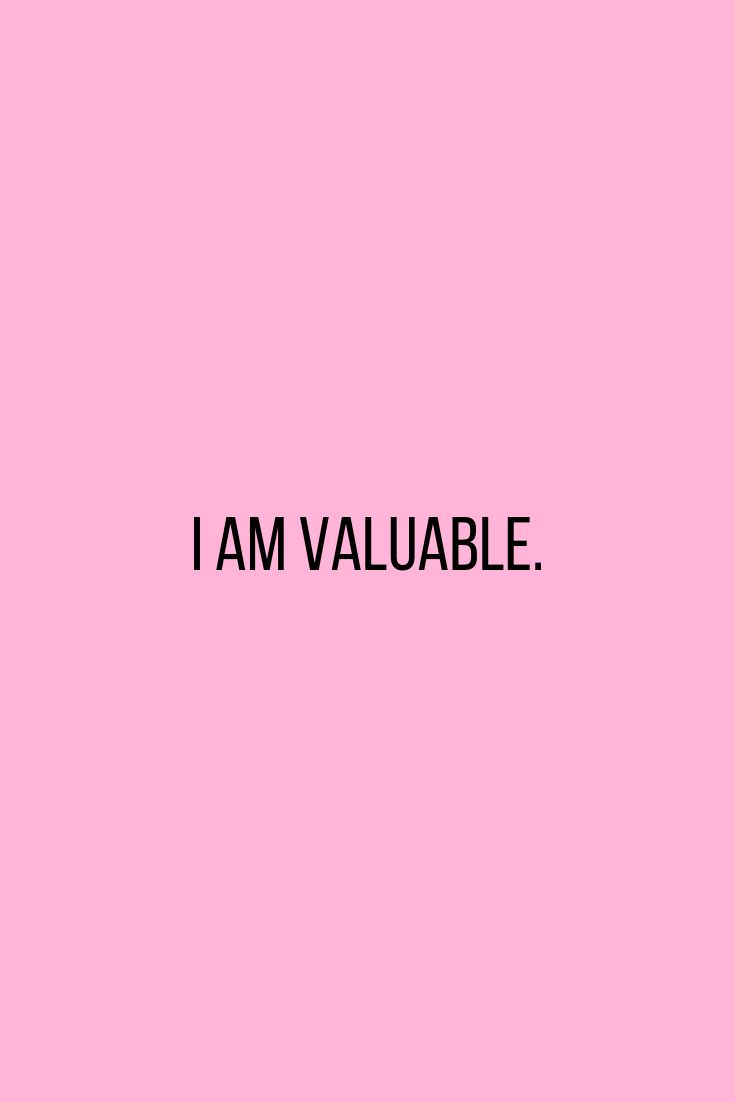 the words i am valuable against a pink background