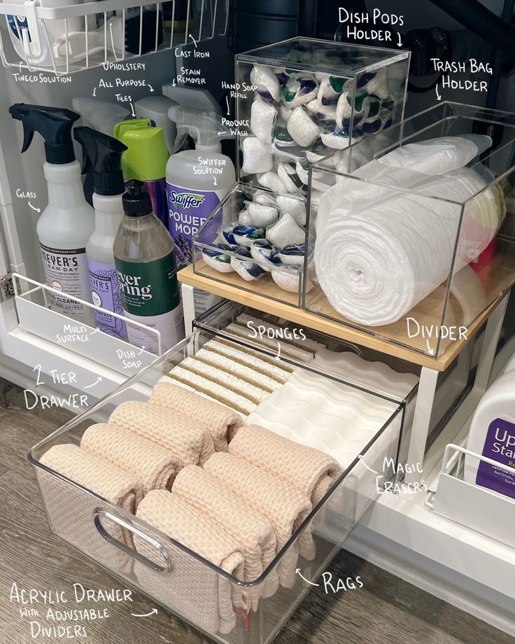 an organized bathroom drawer with lots of toiletries and cleaning products labeled on the bottom