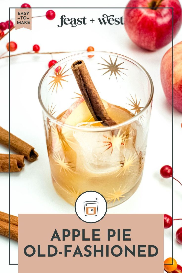 an apple pie old - fashioned cocktail in a glass with cinnamon sticks and apples around it