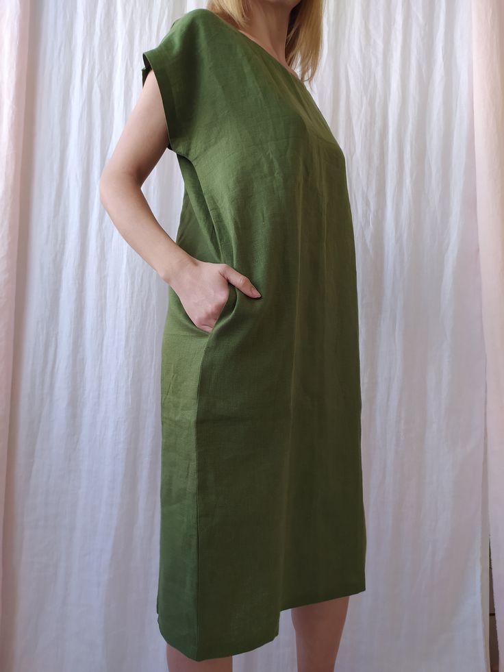 "Linen dress for women, it's elegant, minimalist, and is sure to compliment every occasion, from formal gatherings to outings with friends. Made from 100% European flax, length is ± 110 cm (43\") Before placing an order, check the approximate measurements given below. If you are unsure about your size or would like to adjust the length of the item, you could leave your personal measurements (height, bust, waist and hips) in a personalization box. SIZE and FIT Size XS Bust 85cm / Waist 66cm / Hip Linen A-line Shift Dress, Linen Shift A-line Dress, Linen Shift Dress With A-line Shape, Linen Dress With Straight Neckline For Daywear, Solid Color Tunic Dress For Daywear, Shift A-line Linen Dress, Elegant Linen Dress With Side Slits, Minimalist Summer Maxi Dress, Plain Linen Spring Dress