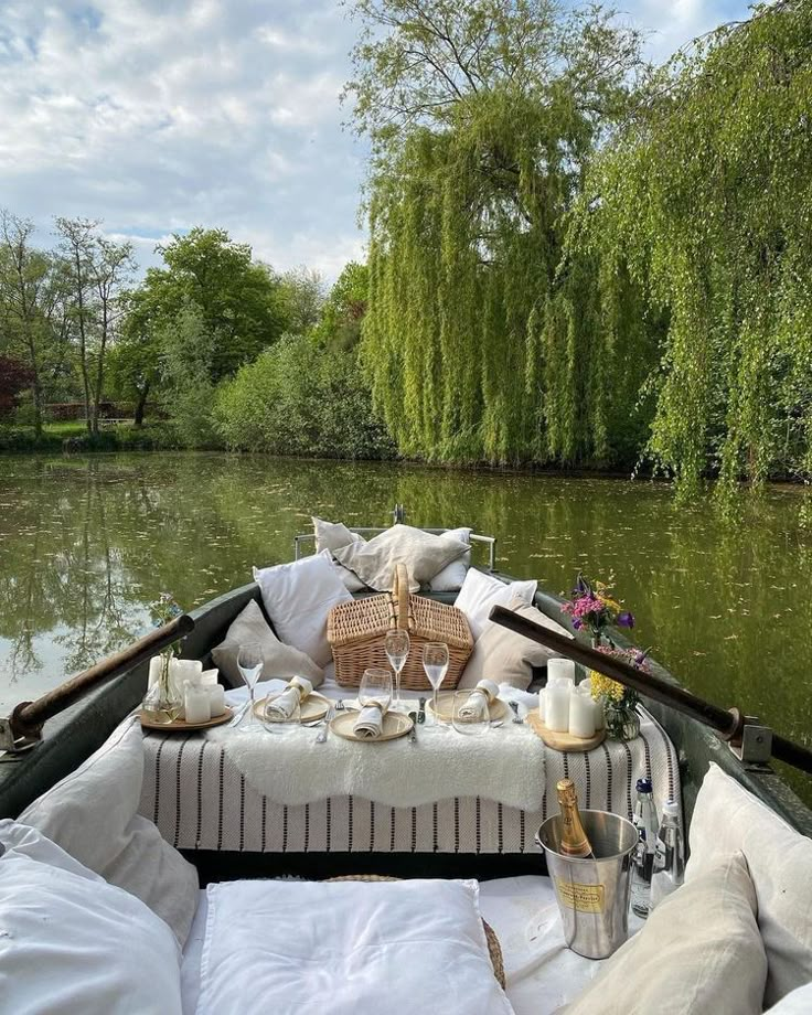 a boat filled with lots of pillows and food on top of it's side