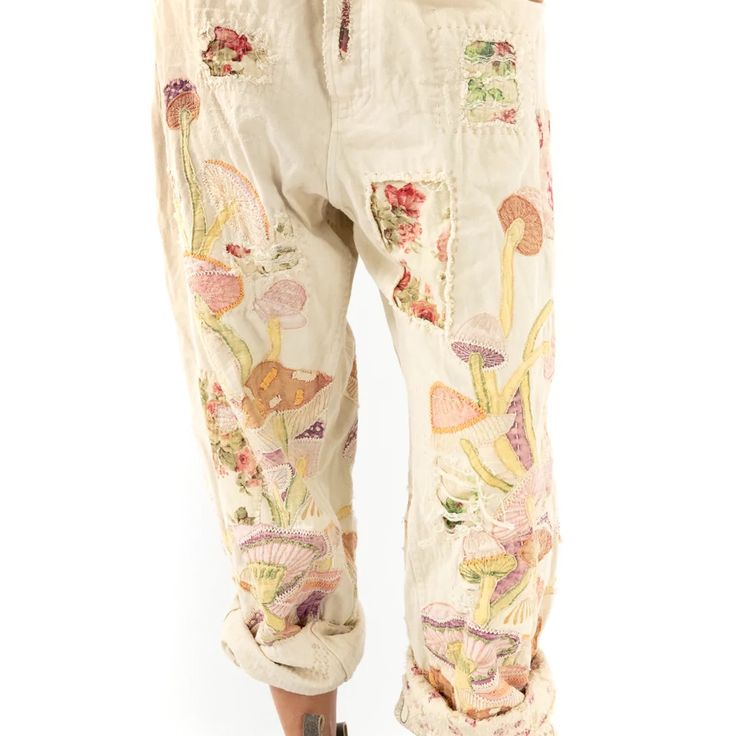 Cotton Denim Mushroom Embroidered Miner Denims With Button Waist And Buckle At Back, Distressing Pants 310 - Moonlight-Os Smallest Waist- 28” Largest Waist- 34” Beige Floral Embroidered Pants For Spring, Beige Cotton Pants With Floral Embroidery, Beige Floral Embroidered Bottoms For Spring, Beige Floral Embroidery Pants For Summer, Spring Beige Floral Embroidered Bottoms, Spring Embroidered Relaxed Fit Pants, Relaxed Fit Bottoms With Floral Embroidery For Spring, Embroidered Relaxed Fit Pants For Spring, Relaxed Fit Embroidered Pants For Spring