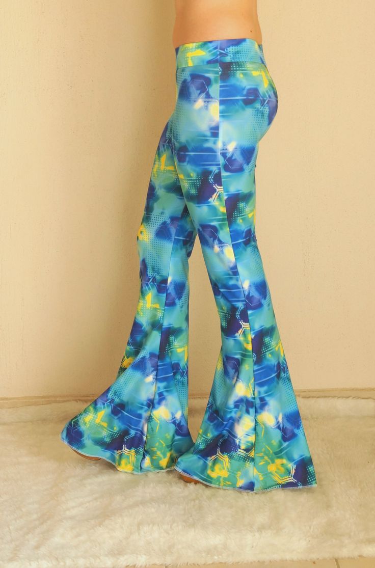 "Blue festival womens bell bottoms Burnt organge and chevron print boho hippe style adorable stretchy so comfortable women bell bottoms. You can wear this awesome women leggings for the Festival,Activity,Party and school.Also you can wear to go to Clubs and yoga.. If you would like to feel the 70s clothing style this stretchy unique bell bottoms is just for you. Choose your size.This black bell bottoms made by stretchy jersey and avaliable plus size XXL.. SIZE CHART; Extra Small (US 0-2) (AU 6 ) Trendy Summer Full-length Flares, Hippie Wide Leg Flares For Spring, Summer Stretch Flare Jeans With Flared Hem, Hippie Wide Leg Spring Flares, Spring Hippie Wide Leg Flares, Stretch Flare Jeans With Flared Hem For Summer, Trendy Summer Flares With Flared Hem, Trendy Stretch Blue Flares, Trendy Blue Stretch Flares