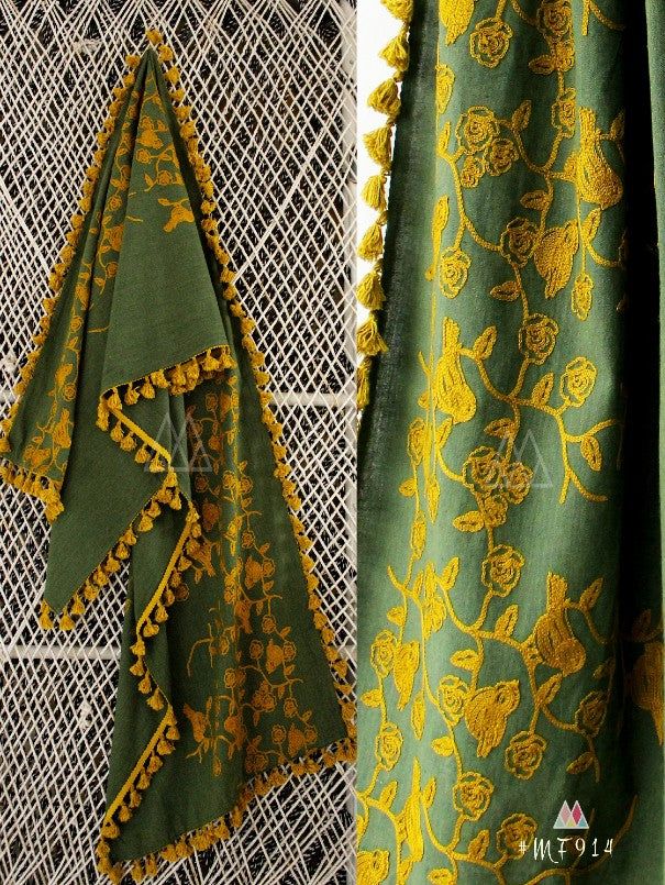 This green unisex stole/scarf is crafted in organic khadi soft cotton. It is embroidered with minute aari work in sparrow motif.It is embellished with dyed cotton tassel lace. Protect your self from sun by wraping it around the face. This green stole is perfect for you casual outfit . The khadi fabric gets softer after every wash. Color: Green Fabric: 100% Khadi - Cotton Base Fabric Work Details: Embroidered, embellished with fancy laces, jute laces, and dyed pom pom laces. Meausrements: Length Festive Green Kurta With Tassels, Traditional Festival Kurta With Tassels, Bohemian Green Chanderi Kurta, Green Kurta With Dupatta For Festival, Green Kurta With Traditional Drape For Festival, Green Embroidered Bohemian Shawl, Bohemian Green Pashmina Shawl In Traditional Drape, Green Embroidered Dupatta Shawl, Green Embroidered Shawl Dupatta