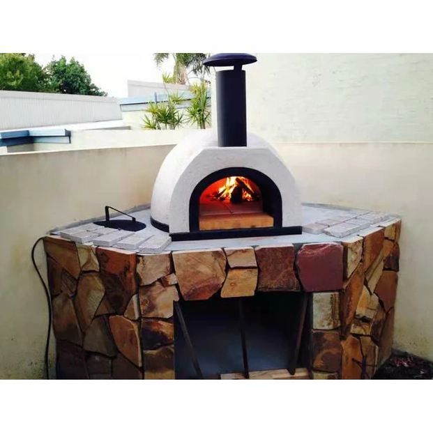 an outdoor pizza oven made out of wood and stone with a fire burning in it