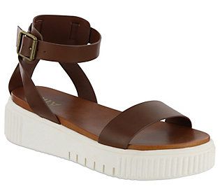 The Lunna sneaker-bottom sandal is a spring athleisure essential. Designed with a sawtooth bottom, this sporty and strappy sandal features an ankle clasp closure for a more secure fit. From MIA. Trendy Sport Sandals With Adjustable Strap For Spring, Brown Synthetic Sport Sandals For Spring, Spring Brown Synthetic Sport Sandals, Brown Sporty Sandals For Summer, Brown Sporty Sport Sandals For Summer, Adjustable Synthetic Sport Sandals For Spring, Sporty Brown Sport Sandals For Summer, Sporty Platform Sandals For Spring, Strappy Sport Sandals With Cushioned Footbed For Summer