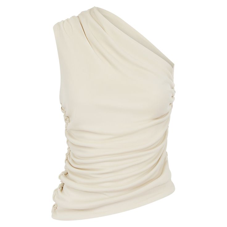 The Aura Top is created for refined femininity, with a beautiful one shoulder ruched detail.  Constructed in locally sourced, premium french crepe for a luxury day to evening look.  Designed and Made in the UK. 100% POLYESTER  UK Knitted Fabric Simple White Top, Luxury Wishlist Ideas, Luxury Tops For Women, Luxury Feminine Off White Top, Chic Tops Classy, Luxury Designer White Top, White One Shoulder Top Outfit, White Fancy Top, Luxury Vintage White Tops