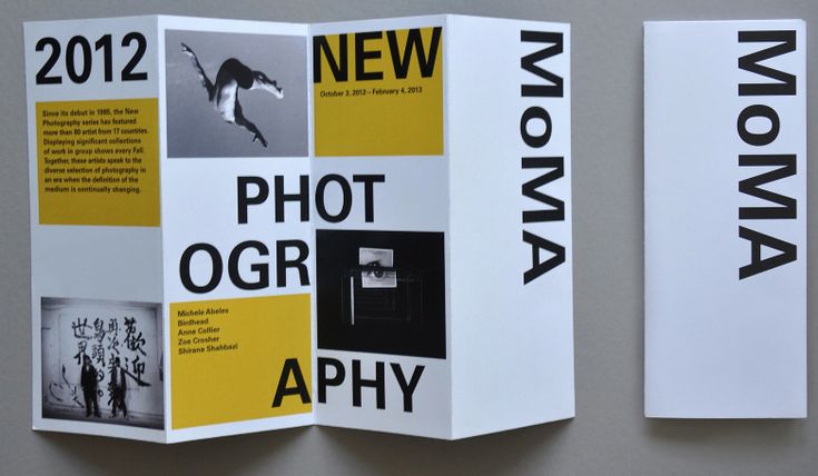 two brochures are displayed on a wall with yellow and black text that reads new photographer aphy