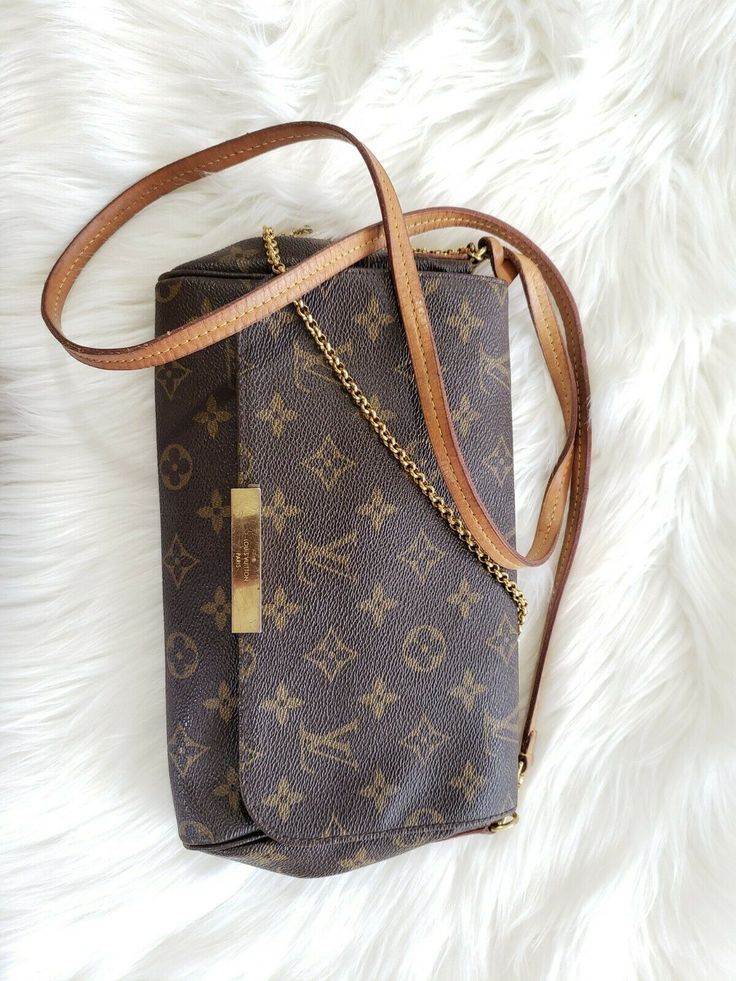 🌸100% AUTHENTIC Louis Vuitton Favorite MM Monogram Crossbody/Clutch Handbag SOLD OUT Condition: Great Pre-Own Condition No stains inside. Minor wear on front hardware. Only used it a handful of times. Please refer to ALL PICTURES. Included: Louis Vuitton Favorite MM Handbag. LV Crossbody Strap 🌸 Selling from my personal collection 🌸 Discontinued handbag- SOLD OUT. RARE FIND. Happy to provide more photos or answer any questions! Shipment: Signature Required at Delivery International Buyers responsible for additional shipping costs. All Sales are Final.  Please Review ALL Pictures.   ASK ALL QUESTIONS, check the size & style before purchasing.   ENTIRE SHIPPING PROCESS WILL BE RECORDED TO PREVENT FRAUD. The packaging will be filmed and images archived for buyer and seller protection. Plea Lv Favorite Mm, Lv Favorite, Louis Vuitton Favorite Mm, Favorite Mm, Louis Vuitton Favorite, Mm Monogram, Crossbody Clutch, Clutch Handbag, Crossbody Strap