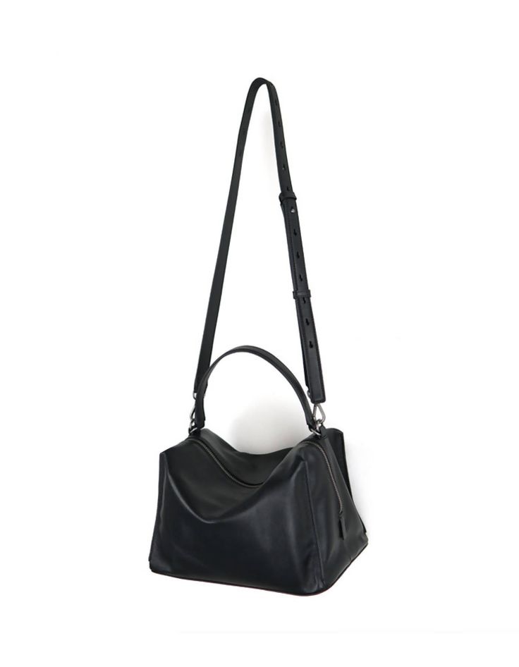 Valley Cube Shoulder Bag-Black is simple and elegant, its spacious interior provides room for all the daily essentials and more, it is perfect for everyday use.This bag is made with premium full-grain Italian leather and lined with Micro Fiber, It has a full zipper closure, with an additional inner zipper pocket, it featuring an adjustable leather shoulder strap. This bag can be carried crossbody or on the shoulder./Genuine Italian natural Nappa leather/Lightweight/Long adjustable shoulder strap Minimalist Business Bag With Detachable Handle, Classic Square Hobo Bag For Everyday, Classic Top Handle Hobo Bag For Business, Sleek Top Handle Satchel For Daily Use, Black Bucket Bag With Detachable Handle For Business, Minimalist Leather Bags With Detachable Strap, Black Business Bucket Bag With Detachable Handle, Square Leather Hobo Bag With Top Carry Handle, Leather Square Hobo Bag With Top Carry Handle