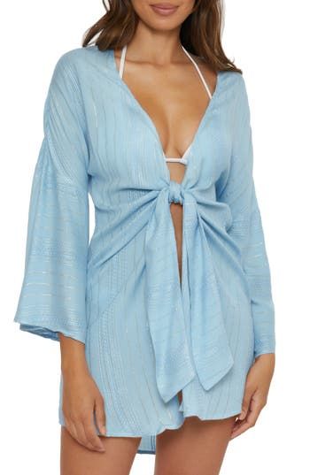 Metallic stripes shimmer in the sunlight in the cover-up tunic designed with a tie front that makes it perfect for throwing on after a day by the water. 33" length (size Medium) Ties at front Deep V-neck Unlined Long sleeves 99% rayon, 1% metallic fibers Hand wash, line dry Imported Tied V-neck Tops For Vacation, Beachwear Wrap Cover-up With Tie Waist, Summer V-neck Tied Tops, V-neck Swimwear With Tie Waist For Summer, Spring V-neck Top For Poolside, Tied Tops For Vacation, V-neck Beach Dress With Tie Back, Spring Beach Party Cover-up With Tie Waist, Spring V-neck Swimwear With Tie Waist