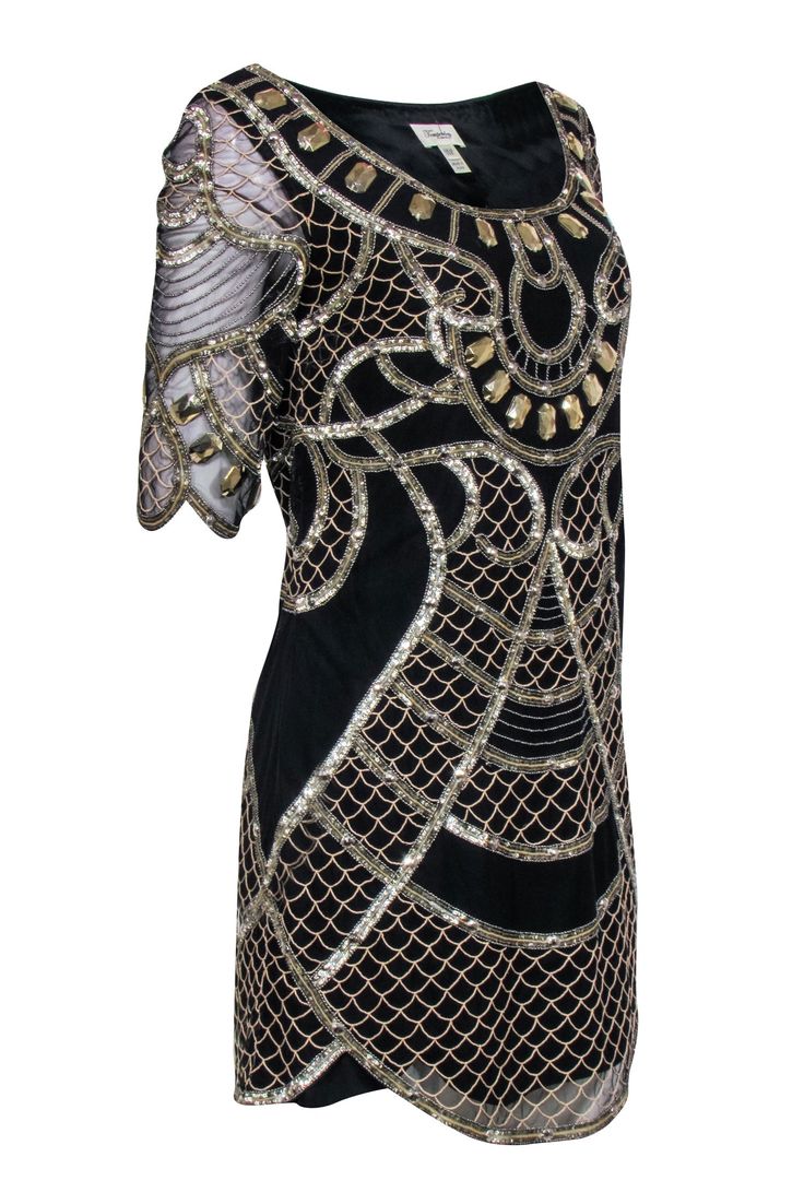 Show off your fabulous flapper fashion in this glamorous dress that marries roaring 20's charm with modern elegance from Temperley London. The dress features a deep scoop neckline, scalloped hem and sleeves, and a tantalizing blend of gold and black beading that dances over sheer fabric lined for your comfort. Paired with a statement headband and T-strap heels, you'll be the belle of any jazz-age-inspired soirée. Size 6 Shell 100% Nylon Lining 100% Silk Gold & silver embellishment Scalloped hem Gatsby Style Fitted Sequin Cocktail Dress, Fitted Flapper Style Sequin Evening Dress, Fitted Gatsby Style Sequin Cocktail Dress, Fitted Gatsby Sequin Cocktail Dress, Fitted Embellished Gatsby Sequin Dress, Fitted Gatsby Style Embellished Sequin Dress, Gatsby Style Fitted Sequin Dress For Party Season, Fitted Gatsby Sequin Dress For Party Season, Embellished Flapper Evening Dresses