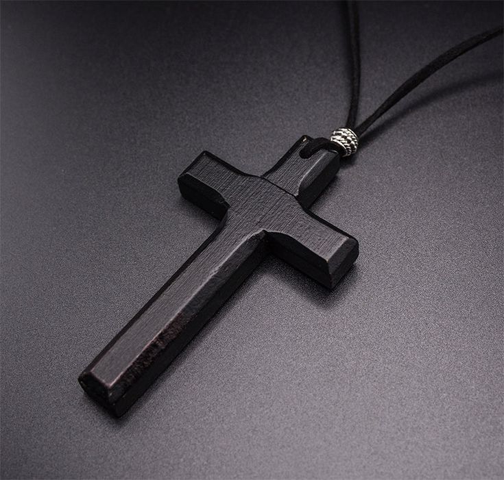 Discover timeless charm with our Handmade Vintage Leather Cord Cross Necklace. This beautifully crafted necklace is designed for both men and women, featuring a wooden cross pendant suspended from a vintage leather cord. Its rustic elegance and classic appeal make it a perfect choice for those seeking a cross necklace that exudes character and style. Embrace a symbol of faith with a touch of vintage flair. Dimensions: Personalized Engraving Service. Leave engraving note in the message box under "What would you like engraved on your Necklace" (letters and/or heart symbols and font style). For fonts option, we suggest you google "fonts" and let us know which one would you like to use. A Cross Necklace, Leather Cord Jewelry, Cross Necklace For Men, Cross Jewelry Necklace, Wooden Watches For Men, Cord Jewelry, Google Fonts, Wooden Necklace, Wooden Cross