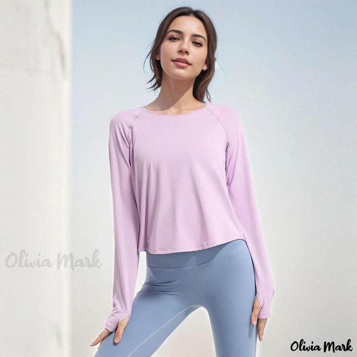 Olivia Mark - Breathable Long-Sleeved Yoga Top - Stylish Fitness Apparel Solid Long Sleeve Activewear For Spring, Pink Long Sleeve Tops With Thumbholes, Solid Long Sleeve Yoga Tops, Long Sleeve Solid Tops For Yoga, Purple Long Sleeve Athleisure Activewear, Purple Long Sleeve Activewear For Spring, Purple Long Sleeve Yoga Top, Stretch Lavender Sports Top, Lavender Sports Top With Stretch