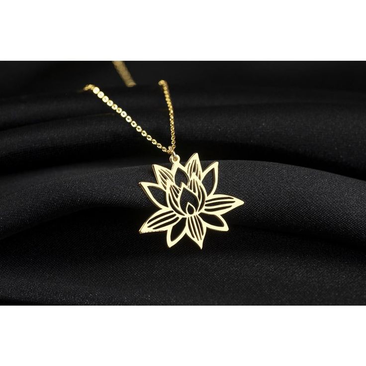 Elevate your ensemble with the ethereal charm of the Lotus Flower Necklace from Sussex Home. This exquisite piece symbolizes purity and is meticulously handcrafted in sterling silver, then adorned with a lustrous gold plating, making it a standout accessory for any occasion.

- Material: Sterling Silver, Gold Plated
- Color: Gold
- Gender: Female
- Age Group: Adult

Ideal for bridesmaids, friends, or as a cherished gift to yourself, this necklace promises to add a touch of elegance and meaning t Spiritual Yellow Gold Jewelry With Birth Flower, Spiritual Yellow Gold Birth Flower Jewelry, Elegant Brass Flower Necklaces, Elegant Flower Shaped Brass Necklaces, Elegant Brass Flower Necklace, Elegant Flower-shaped Brass Necklace, Gold Spiritual Charm Necklace With Flower Pendant, Gold Spiritual Flower Pendant Charm Necklaces, Gold Flower Pendant In Sterling Silver