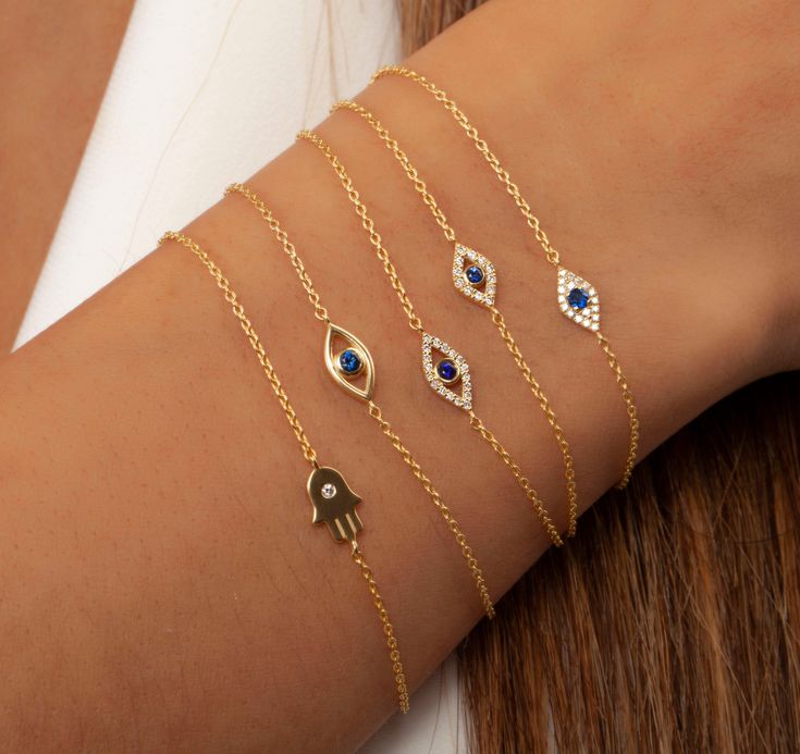 This 14k sapphire and diamond evil eye bracelet is a symbol of protection. Perfect for layering or to gift someone special. __________________________________________M A T E R I A L & L E N G T HAvailable in 14k Yellow Gold, 14k Rose Gold, 14k White GoldStone: Natural DiamondBracelet length: 6+1 inches (Please let us know if you prefer a different length)-- SMALL --Charm Size: 8x5 mmPrimary Stone: .06 Diamond | .07 Blue SapphireNumber of stones: 12 Diamonds | 1 Blue Sapphire-- LARGE --Charm Size Gold Bracelets With Diamond Eyes As A Gift, Elegant Evil Eye Bracelet With Diamonds As Gift, Blue Diamond Bracelet Gift, Elegant Evil Eye Bracelets As A Gift, 14k Gold Evil Eye Bracelet Gift, Evil Eye Diamond Jewelry As Gift, Diamond Evil Eye Jewelry Gift, Evil Eye Diamond Jewelry Gift, 14k Gold Evil Eye Bracelets As Gift