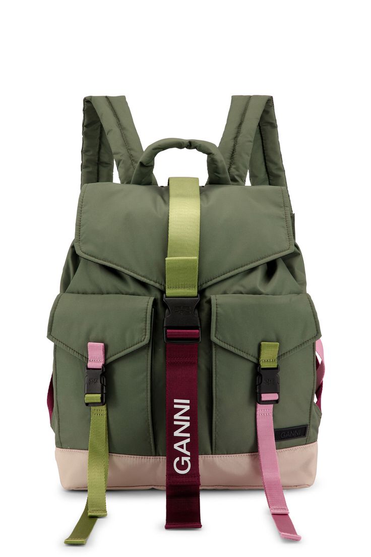 This Green Tech Backpack is made from recycled polyester. The backpack features adjustable and padded shoulder straps, a top handle, front buckle fastenings, front pockets, a foldover top and a GANNI logo. Functional Nylon Backpack With Detachable Strap, Sporty Nylon Backpack With Multiple Pockets, Functional Backpack With Detachable Strap For Outdoor, Nylon Bag With Detachable Strap For Outdoor Activities, Sporty Nylon Bag With Removable Padding, Outdoor Backpack With Detachable Strap, Modern Green Nylon Backpack, Sporty Green Backpack With Adjustable Strap, Travel Backpack With Buckle Closure