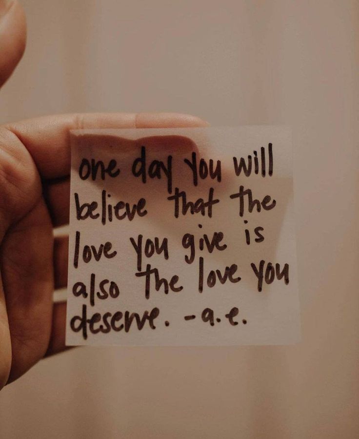 someone is holding up a piece of paper with the words, one day you will believe that the love you give is also the love you deserves