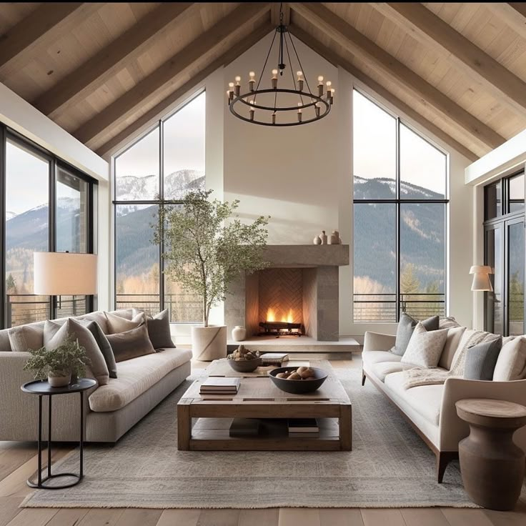 a living room filled with furniture and a fire place in the middle of a room