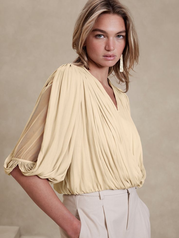 Cropped Wrap Pleated Blouse | Banana Republic Factory V-neck Party Top With Gathered Sleeves, Chic Beige Balloon Sleeve Tops, Chic V-neck Padded Blouse, Chic V-neck Top For Spring Formal Events, Chic Padded V-neck Blouse, Chic V-neck Top For Formal Spring Occasions, Chic Spring Formal V-neck Top, Elegant Summer Blouse With Surplice Neckline, Office V-neck Blouse With Blouson Sleeves