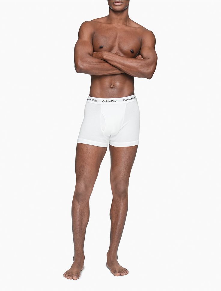 A Calvin Klein icon. The essential designer trunk reinvented in extra-soft cotton stretch. Made with wicking to keep you cool and dry. Designed with the original Calvin Klein logo waistband, this is a sporty look that feels sexy everyday. With a functional fly, supportive pouch and more coverage than our hip brief, this style is easy under anything.  Material: 95% Cotton, 5% Elastane. Ideal Male Body, Best Black Friday, Woman Silhouette, Calvin Klein Men, Sporty Look, Calvin Klein Black, Party Shirts, Trunk, Calvin Klein