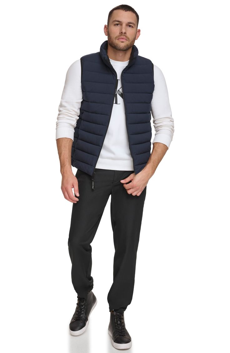 Whether you're deep in the backcountry or just your own backyard, you'll appreciate the cozy core warmth of this vest coated in a water-resistant finish. Front zip closure Stand collar Hidden side-zip pockets Water resistant Lined 100% polyester Machine wash, line dry Imported Casual Hiking Vest With Fleece Lining, Casual Waterproof Nylon Puffer Jacket, Casual Winter Hiking Vest, Casual Sleeveless Puffer Jacket With Pockets, Casual Sleeveless Puffer Jacket, Casual Insulated Puffer Jacket For Hiking, Nylon Hiking Vest For Fall, Casual Nylon Hiking Vest, Nylon Vest For Outdoor Activities In Fall