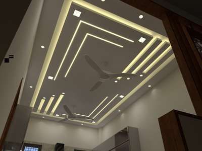 the ceiling in this room is made up of white lights and recessed lighting fixtures