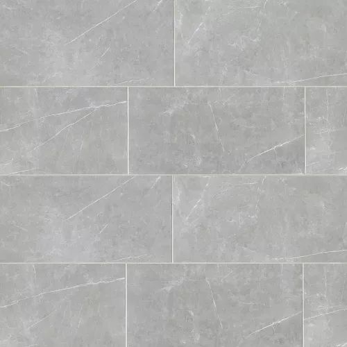 a white marble tile floor with grey veining on the sides and gray grout