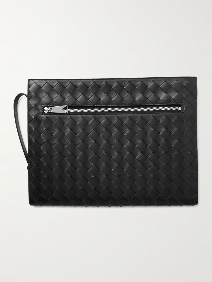 Bottega Veneta's 'Avenue B.' pouch is sized for a tablet, making it ideal for everything from boardrooms to travelling. It's made from black leather that's woven using the label's signature intrecciato technique and finished with a zipped pocket at the back. Designer Travel Wallets In Pouch Shape, Designer Travel Wallet Pouch, Designer Travel Pouch Wallets, Luxury Rectangular Pouch With Zipper, Luxury Rectangular Pouch With Zipper Closure, Designer Black Pouch For Travel, Designer Black Clutch With Zipper Closure, Designer Black Bag With Zipper Pouch, Designer Travel Pouch Clutch