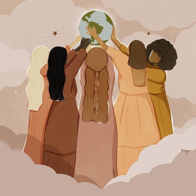 four women holding up a globe in the sky