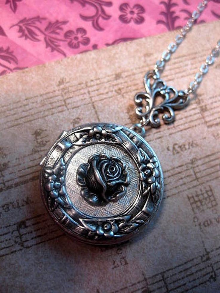 Silver Locket Necklace Photo Locket Pendant Flower Floral | Etsy Silver Round Pendant With Rose Design, Vintage Silver Jewelry With Roses, Vintage Rose Design Jewelry In Rose Color, Vintage Rose Jewelry For Wedding, Handmade Rose-colored Round Jewelry, Vintage Rose-colored Jewelry For Weddings, Vintage Rose Design Jewelry, Vintage Rose Flower Jewelry, Rose Colored Round Jewelry For Weddings