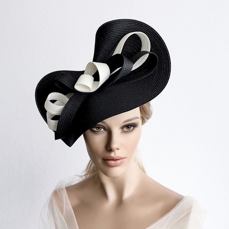 Elegant Black and White Kentucky derby hat for woman. This Black and White fascinate hat is embellished with a big bow. It is a perfect hat for weddings, Royal Ascot horse races, cocktails, derby... It is mounted on a headband. If you want, you can choose the side of the head were you like to wear the fascinator, just convo me. Any color of the fascinator can be changed to order. * PROCESSING TIME: 1 - 10 business days. * DELIVERY TIME (DHL Express): 1-4 business days to all countries Elegant Kentucky Derby Hat With Bow, Elegant Bow Hat For Kentucky Derby, Elegant Formal Hat With Bow, Elegant Bow Fascinator For Party, Fitted Evening Hats With Bow, Elegant Party Fascinator With Bow, Evening Hats With Bow And Short Brim, Evening Hat With Bow For Royal Ascot, Elegant Hat With Bow For Royal Ascot