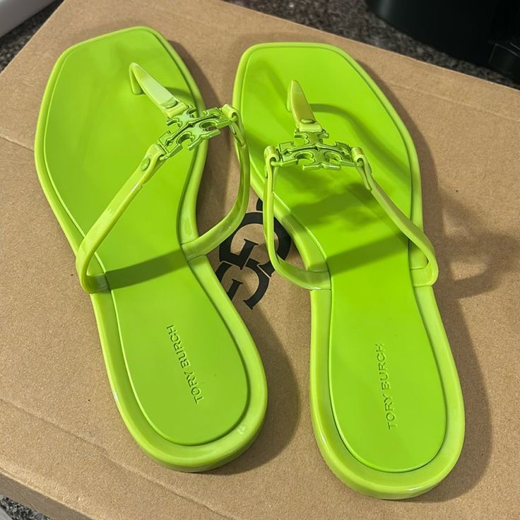 Brand New.Leaf Green.Nwob.Will Come In A Tory Burch Box Just Not The One To These.. Designer Green Open Toe Sandals, Designer Green Sandals With Single Toe Strap, Designer Green Sandals With Round Toe, Green Leather Flip Flops With Round Toe, Designer Flat Green Sandals, Designer Green Flat Sandals, Chic Green Flat Sandals, Green Sandals With Branded Insole And Flat Heel, Tory Burch Sandals