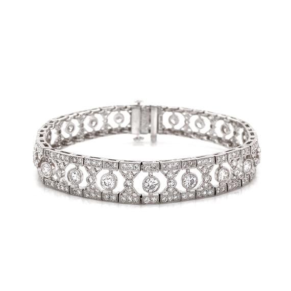 Slim vintage and Art Deco inspired diamond platinum bracelet.  Adorned with white round cut diamonds in 6.12 carat total. Diamonds are all natural in G-H Color Clarity VS.    Platinum 950 bracelet.  Length: 17.5 cm Width. 1 cm Weight: 28.9 g  #maxjewelryinc #jewelry #jewelries #retro #artdeco #bracelet #accessories #fashion #bracelets #luxury #diamonds #diamond #bling #platinum #vintage Art Deco Diamond Jubilee Bracelet, Art Deco Diamond Tennis Bracelet With Single Cut Diamonds, Art Deco Diamond Tennis Bracelet With Brilliant Cut, Art Deco Diamond Tennis Bracelet For Anniversary, Diamond Art Deco Tennis Bracelet For Anniversary, Art Deco Platinum Tennis Bracelet With Diamond Accents, Luxury Platinum Diamond Bracelet With Brilliant Cut, Art Deco White Gold Diamond Bracelet With Brilliant Cut, Art Deco White Gold Bracelets With Brilliant Cut Diamonds