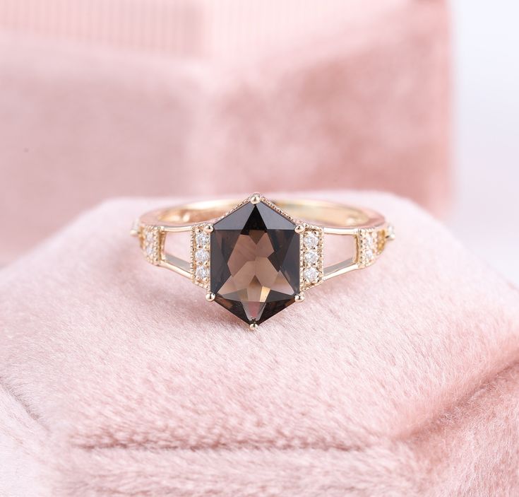 Smoky Quartz Hexagon Casual Ring, Natural Brown Crystal Fine Gemstone Rings, Paris Eiffel Tower Wedding Band Design, Geometric Shape Ring ✧･ﾟ: *✧･ﾟ:* Welcome to Charles Davin Jewelry*:･ﾟ･ﾟ✧ Moissanite - a gemstone known to bring in luck in someone's life, the user can give off a look of elegance. You can give your special someone luck whilst showing your love to them. ✶Material: 10K/ 14K/ 18K ✶Main Stone: Natural Smoky Quartz; 6*9mm ✶Side Stone: Moissanite; 0.15ct ✶Color: D Colorless ✶Clarity: V Elegant Hexagon Jewelry With Prong Setting, Luxury Faceted Ring For Wedding, Luxury Faceted Wedding Ring, Elegant Hexagon Prong Setting Jewelry, Asscher Cut Wedding Jewelry With Accent Stones, Elegant Octagon Rings With Accent Stones, Elegant Octagon Ring With Accent Stones, Yellow Gold Faceted Crystal Wedding Ring, Elegant Faceted Crystal Ring For Wedding