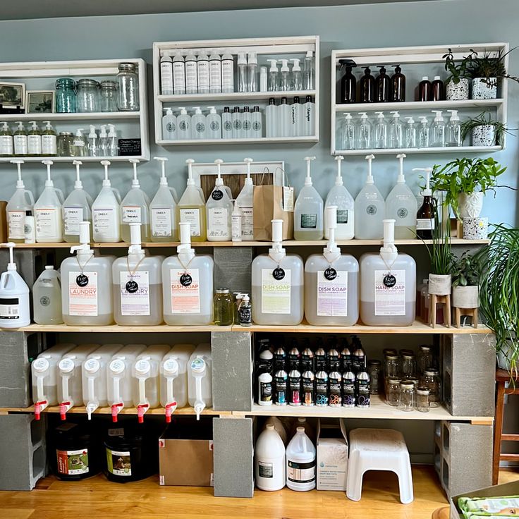 the shelves are filled with many different types of bottles and containers on it's sides