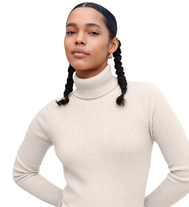 Undyed White Classic Relaxed Fit Ribbed Sweater, Classic Ribbed Turtleneck Top, Fitted Classic Beige Sweater, Fitted Cashmere Top, Classic Stretch Tops For Winter, Classic Winter Tops With Stretch, Classic Winter Stretch Tops, Classic Ribbed Turtleneck For Spring, Fitted Beige Casual Turtleneck